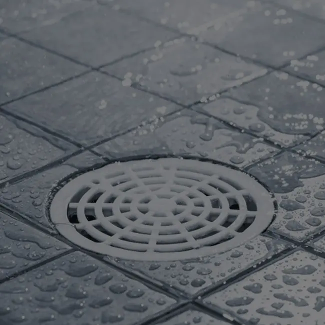 Floor drain on wet tiles