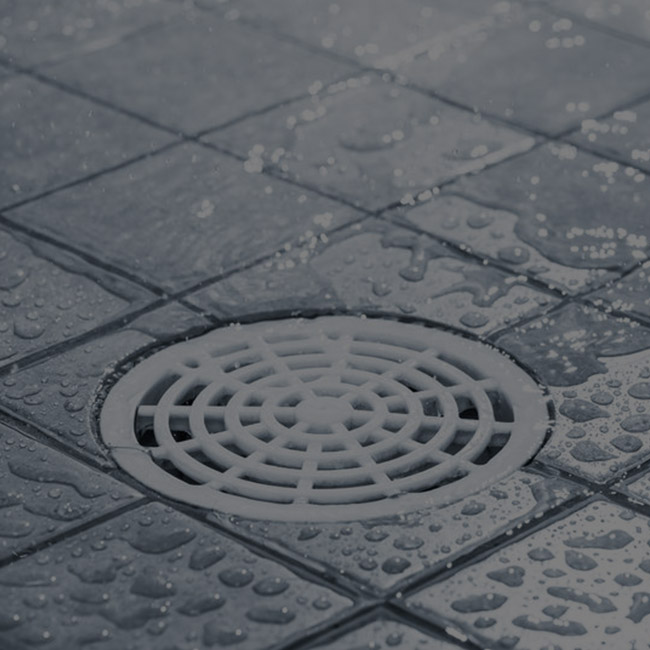 Floor drain on wet tiles